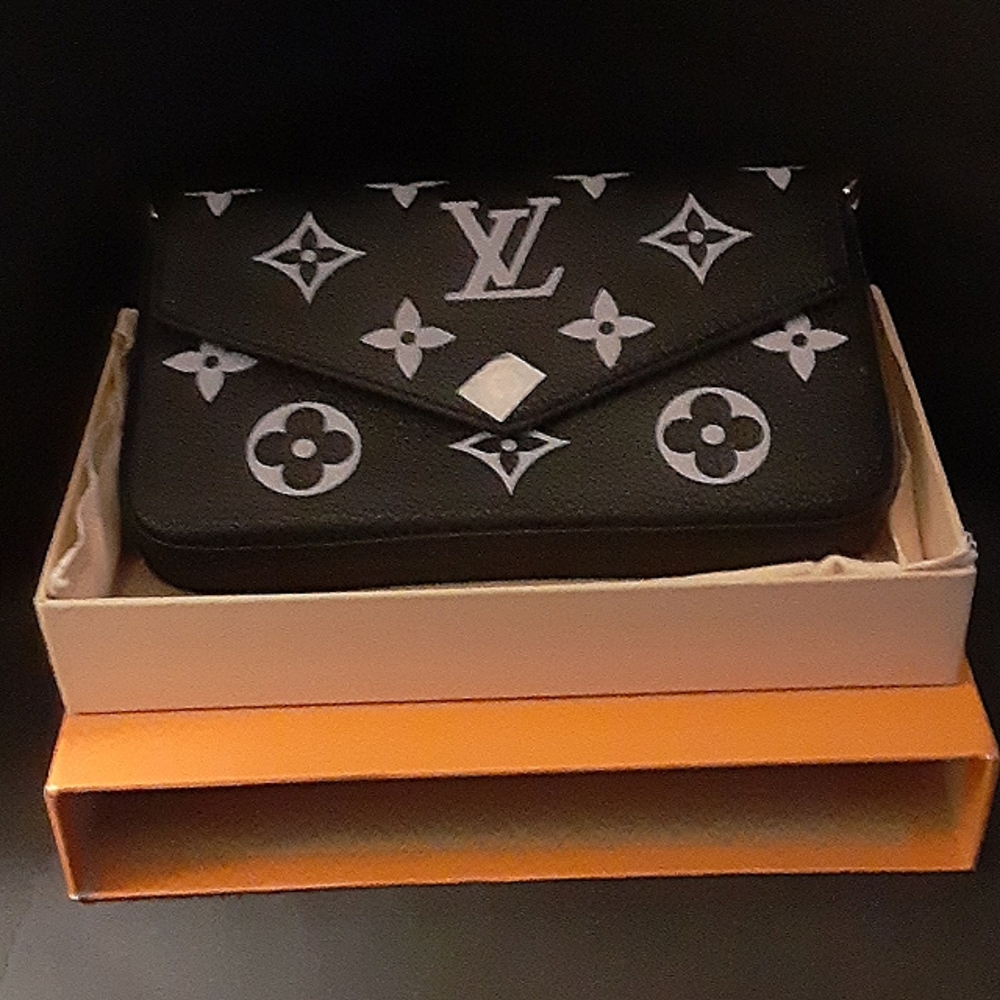 Small designer inspired clutch purse with pouch included